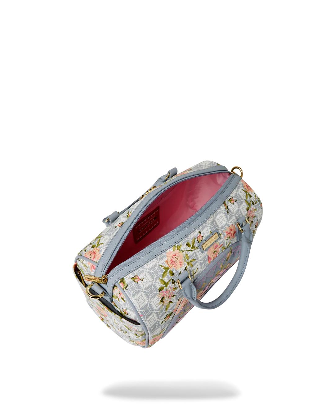 A.I. AFRICAN INTELLIGENCE ELEGANT ENERGY MINI DUFFLE - SANDFLOWER COLL