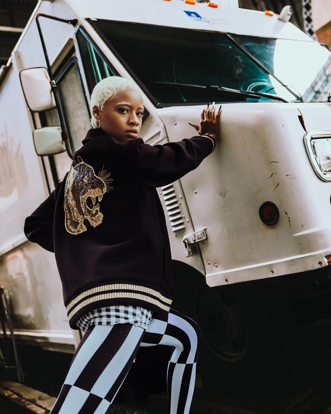 A.I.9 AFRICAN INTELLIGENCE GUILDED LEOPARD - SANDFLOWER COLLAB VARSITY