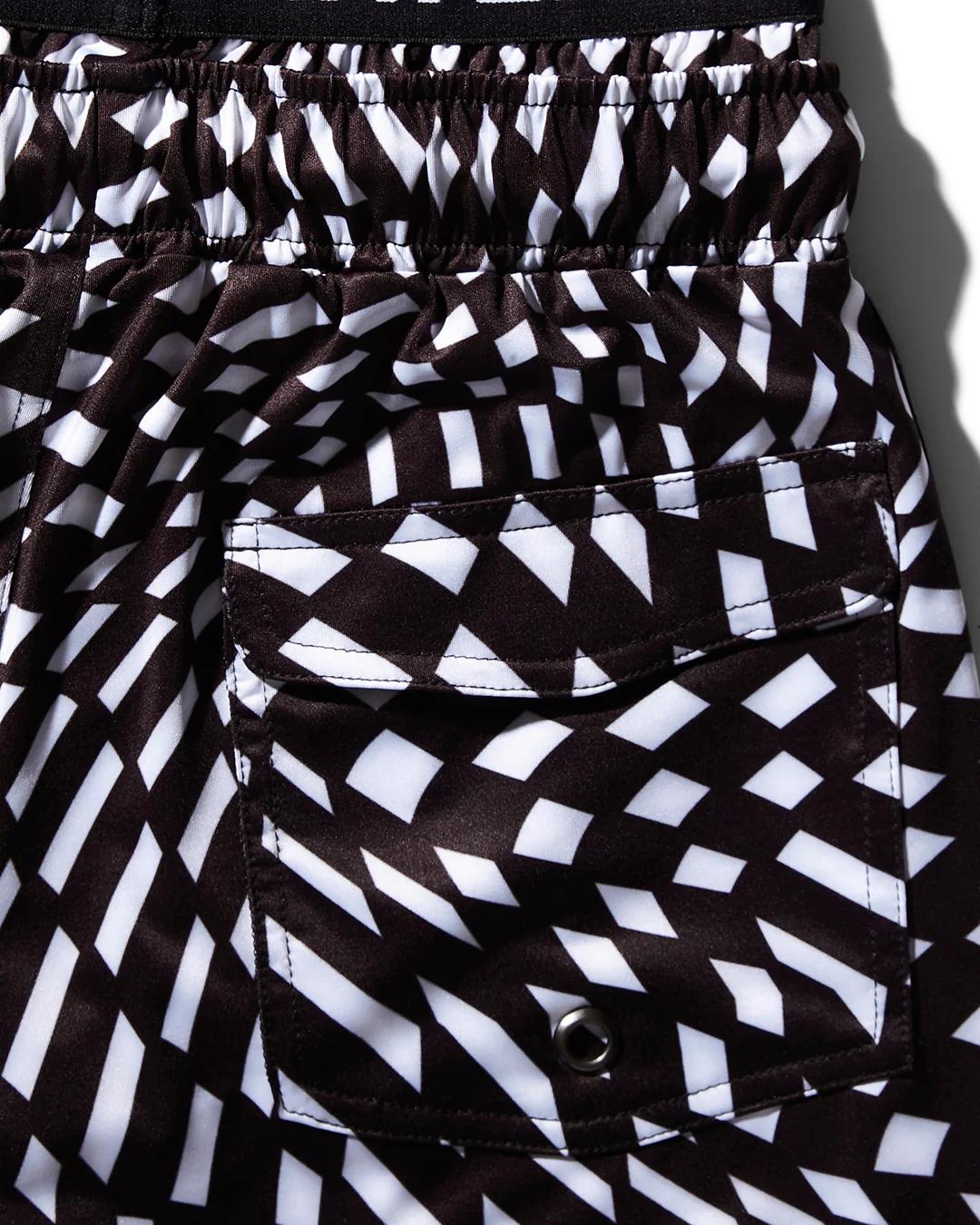 KIDS TRIPPY SWIM TRUNKS