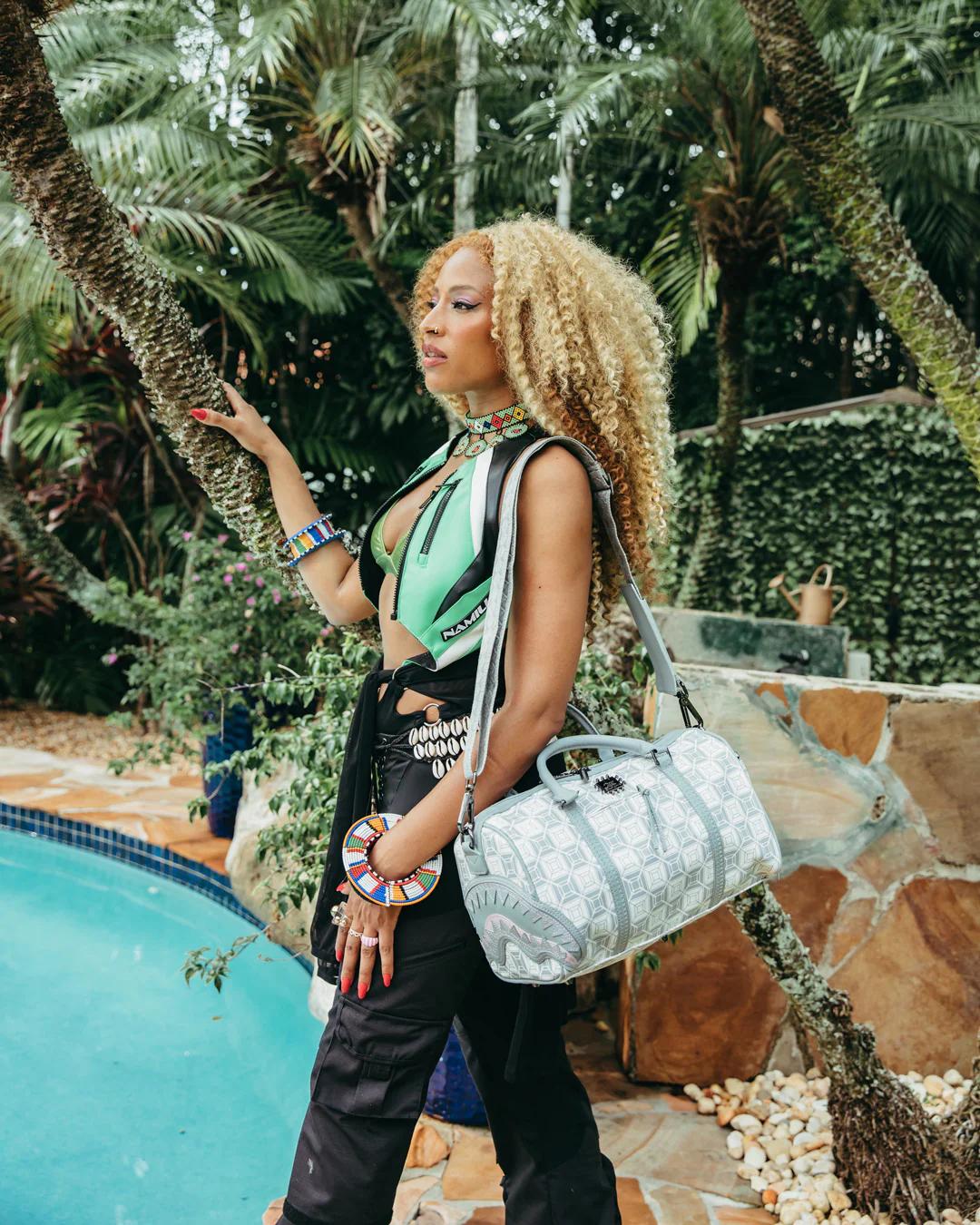 A.I.8 AFRICAN INTELLIGENCE BOOKED & BUSY MINI DUFFLE