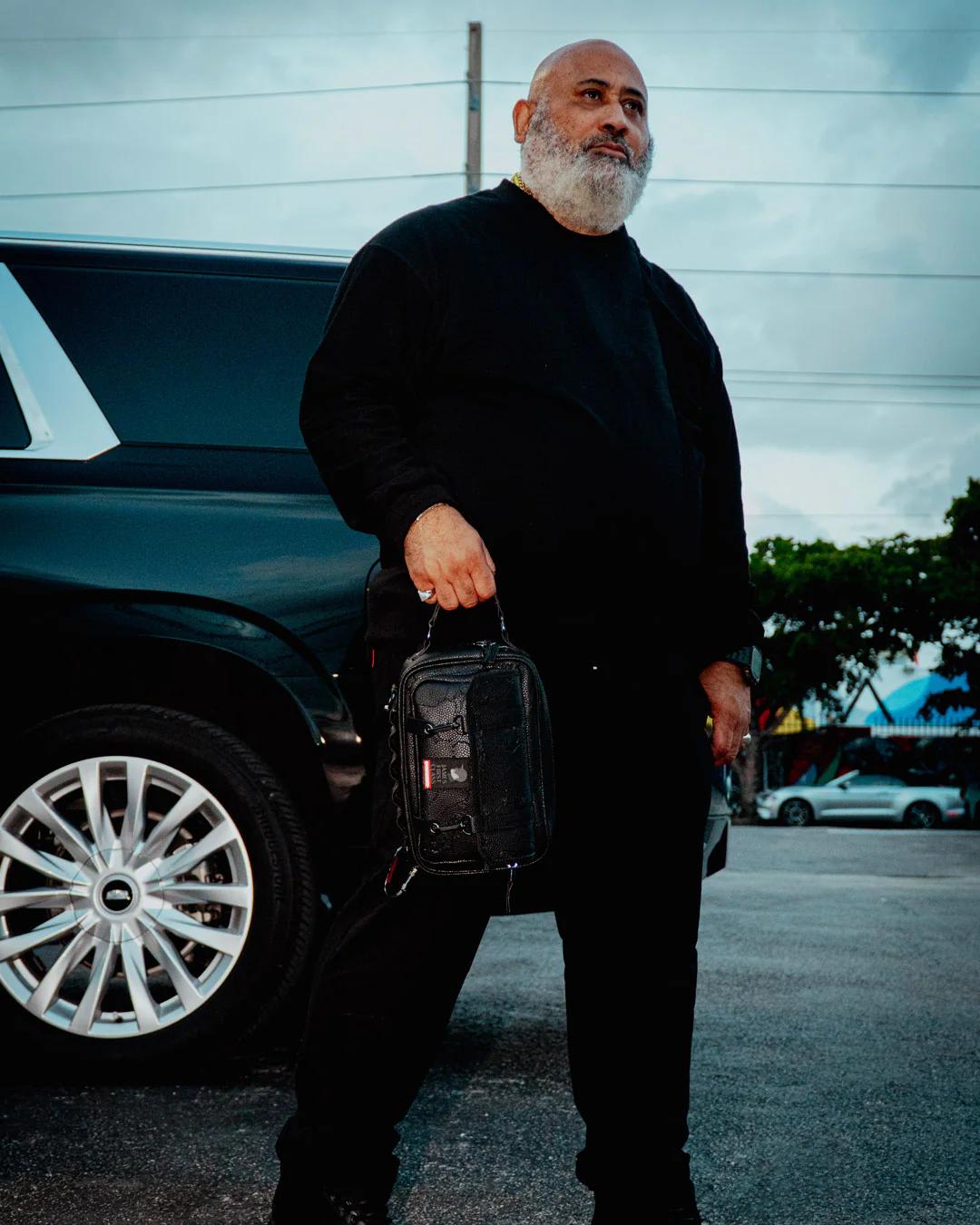 JAMES FIRST CLASS TYCOON TRAVELER CROSSBODY