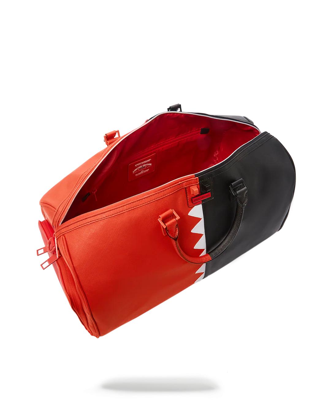 VERTICAL SHARK CUT & SEW DUFFLE